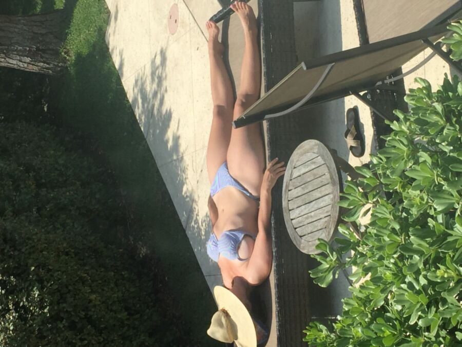 Free porn pics of Wife sunbathing today 1 of 3 pics