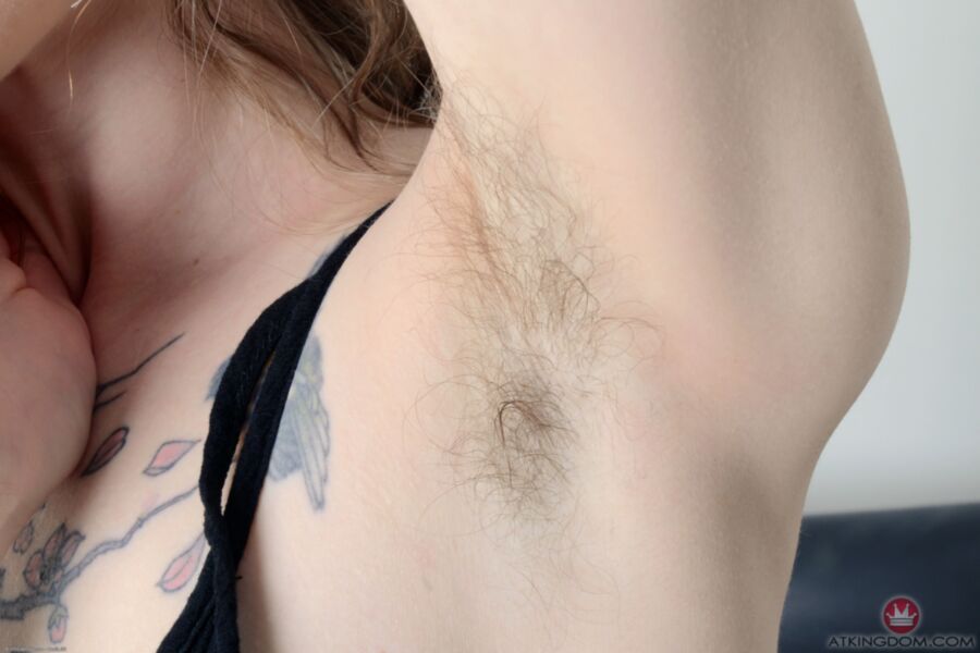 Free porn pics of Tattooed and hairy Finch bares all on her chair. 9 of 83 pics