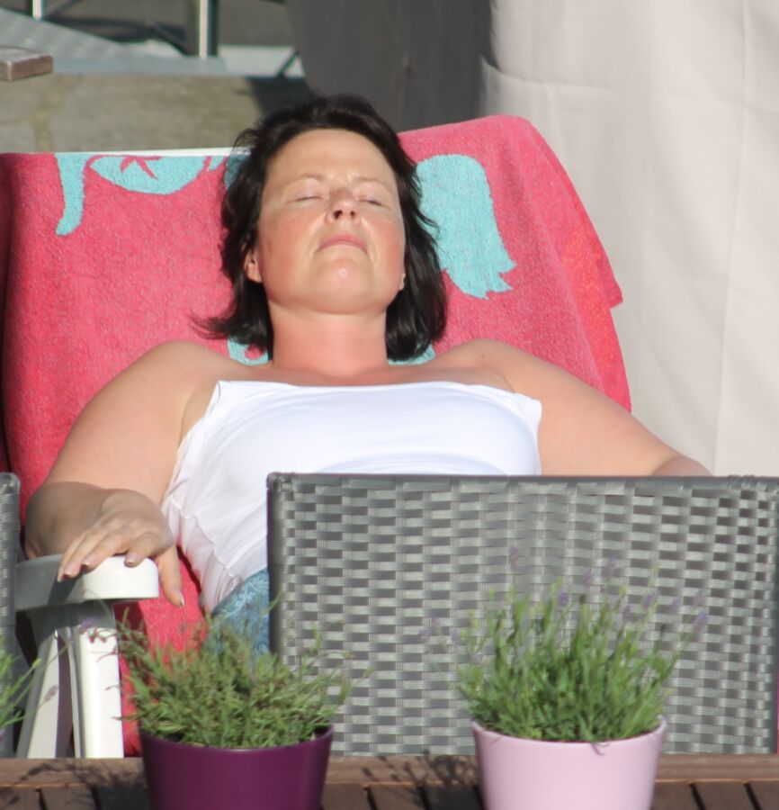 Free porn pics of Spy cam: My neighbours wife sunbathing! 3 of 8 pics