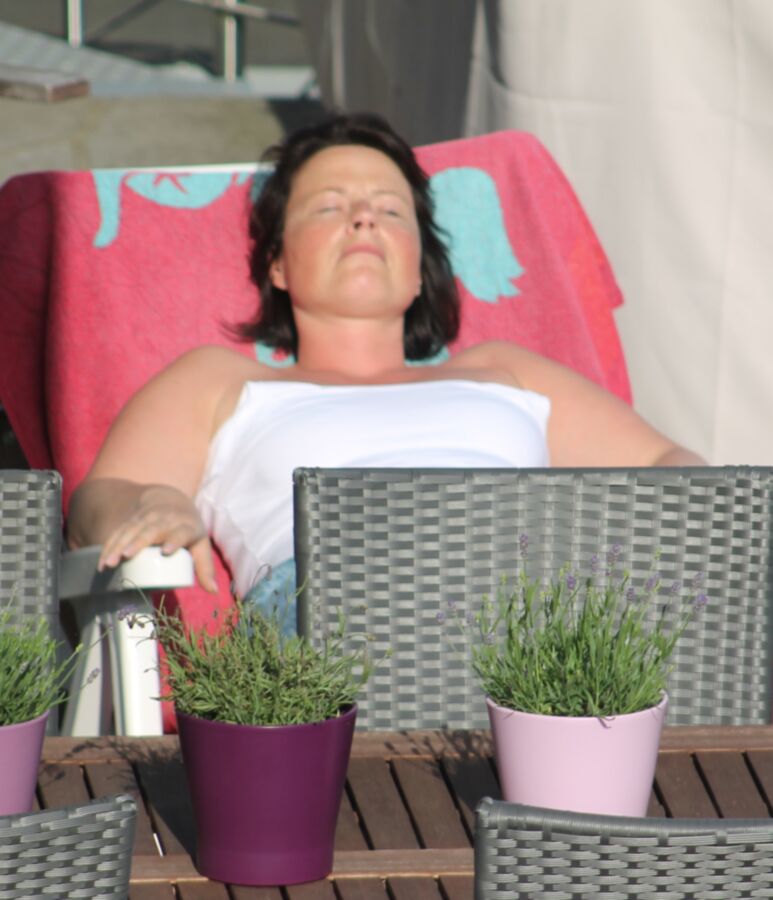 Free porn pics of Spy cam: My neighbours wife sunbathing! 5 of 8 pics