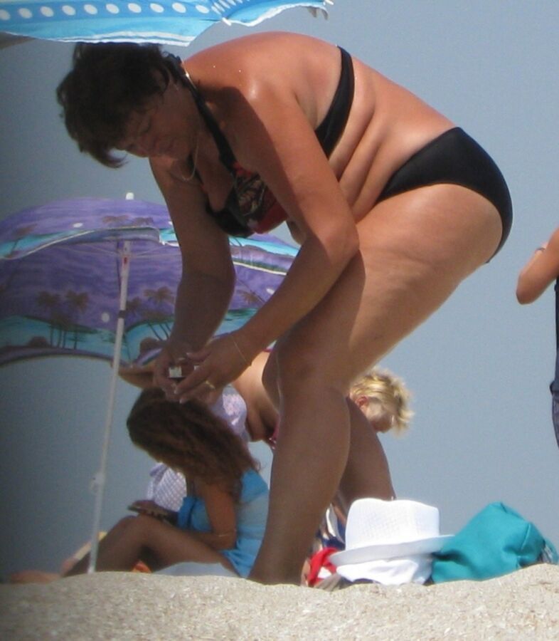 Free porn pics of So Hot Granny beach candid 7 of 12 pics