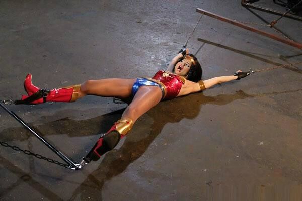 Free porn pics of celeb selena gomez as supergirl wonderwoman bondage tentacles  4 of 7 pics