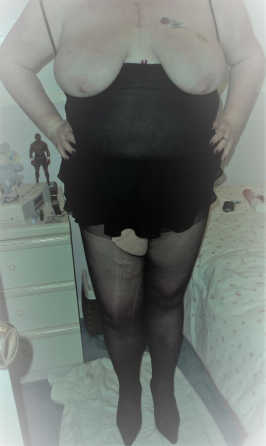 Free porn pics of Stockings & suspenders loving husbands wife. 1 of 5 pics