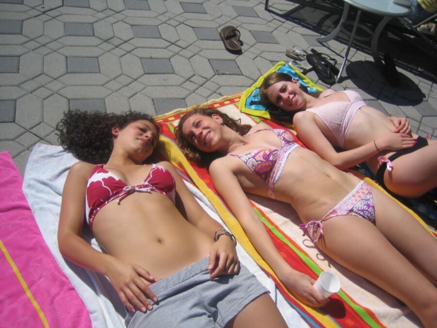 Free porn pics of Ladies in bikinis poolside, at home, but not at the beach. 1 of 31 pics