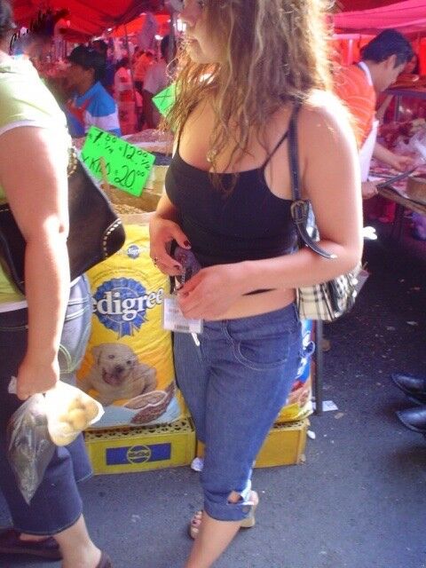 Free porn pics of MEXICAN GIRL TEASING IN A OPEN AIR MARKET 7 of 9 pics