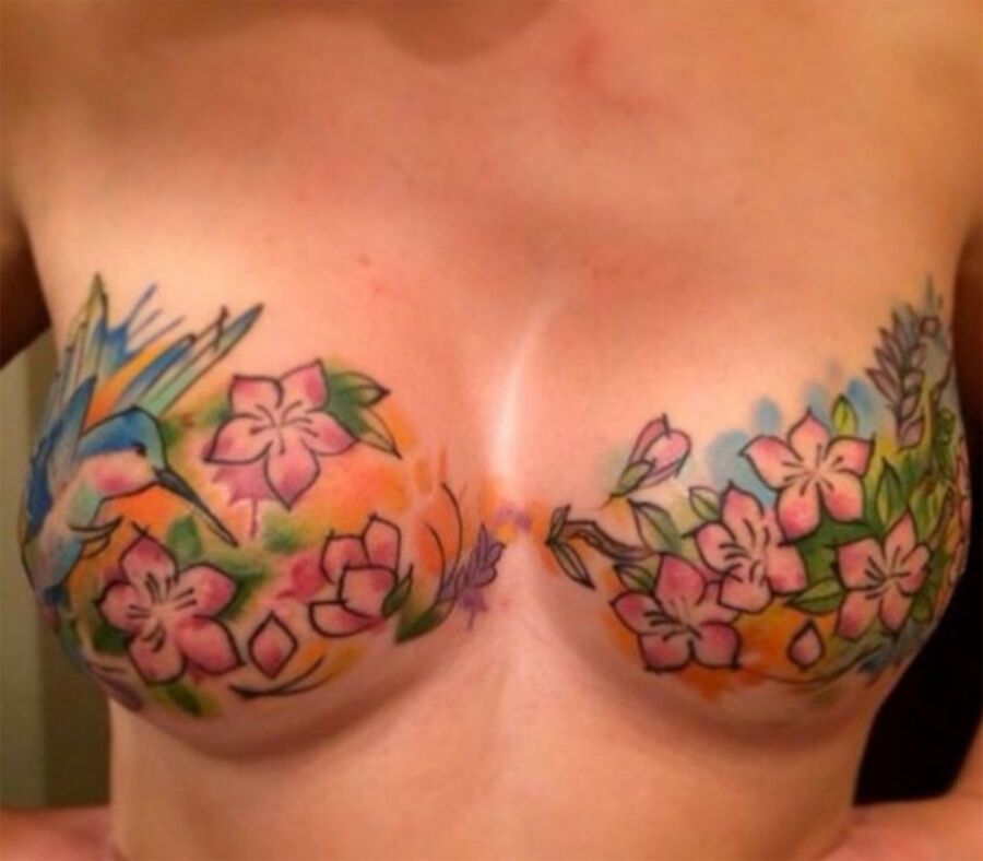Free porn pics of breast and cunt tattoos  3 of 12 pics