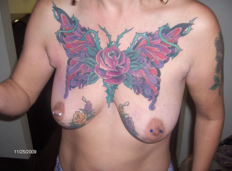 Free porn pics of breast and cunt tattoos  2 of 12 pics