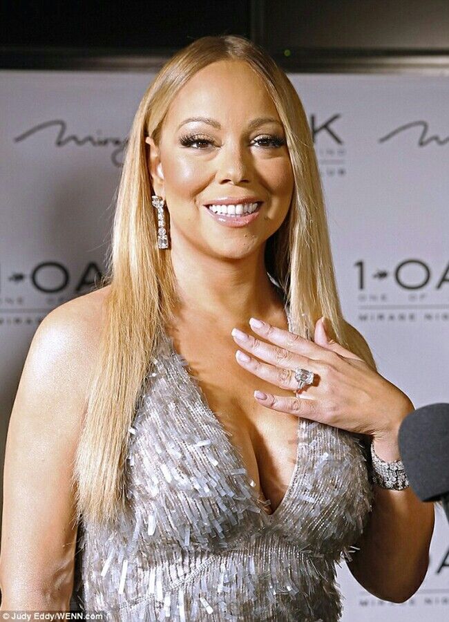 Free porn pics of beautiful Mariah Carey face and cleavage 16 of 39 pics