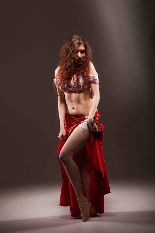 Free porn pics of Curly redhead bellydancer 15 of 36 pics