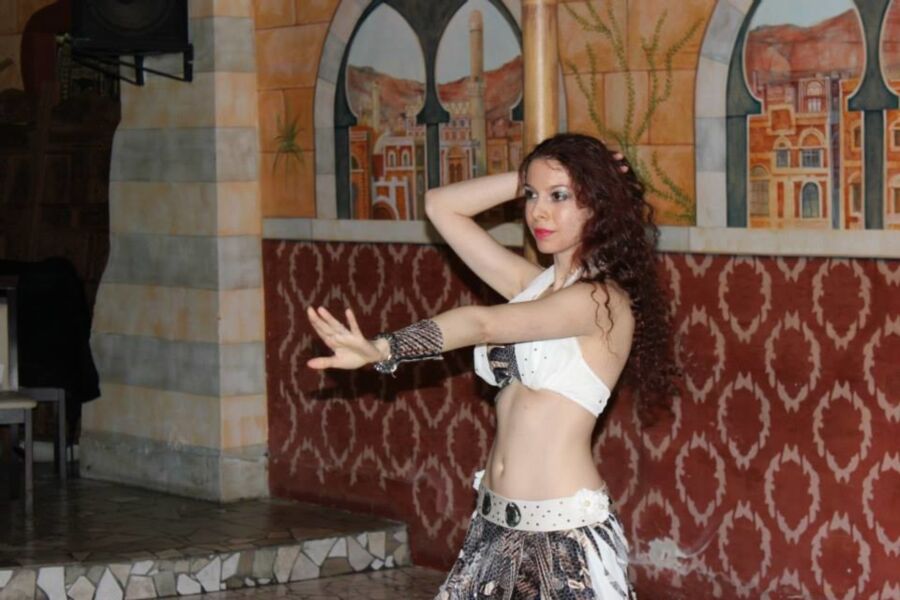 Free porn pics of Curly redhead bellydancer 5 of 36 pics