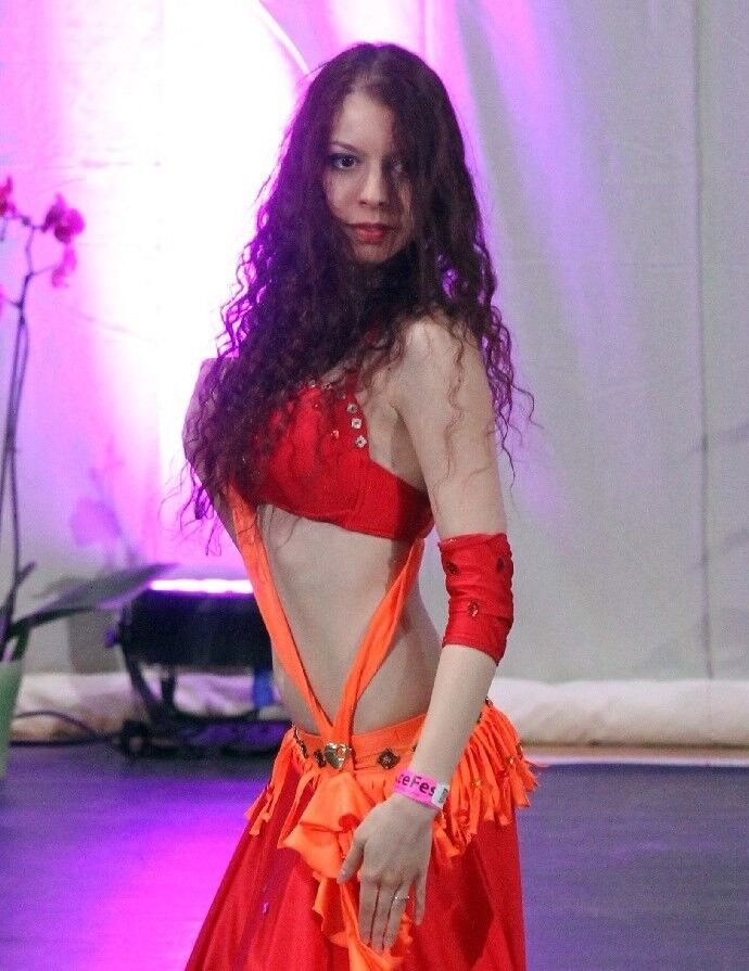 Free porn pics of Curly redhead bellydancer 1 of 36 pics