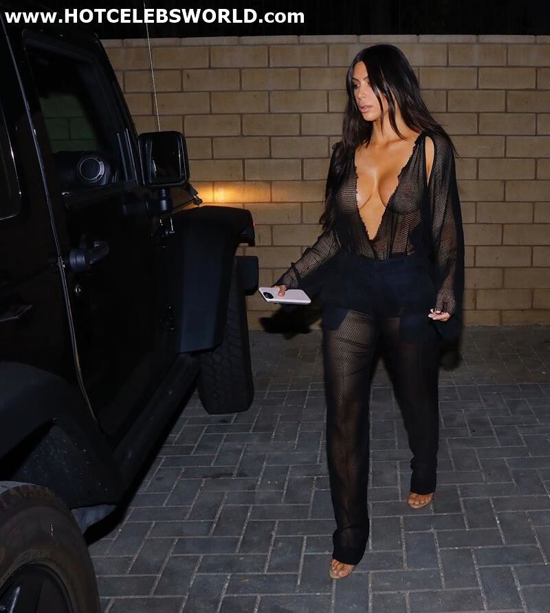 Free porn pics of Kim Kardashian massive cleavage in black sheer dress 3 of 9 pics