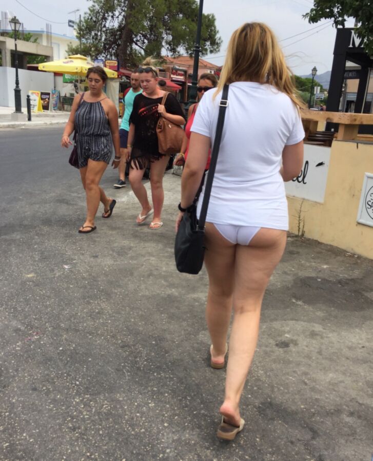 Free porn pics of Dressed only in PANTIES and short SHIRT in public street flashin 7 of 15 pics