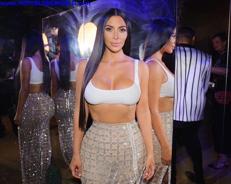 Free porn pics of Kim Kardashian Sexy Cleavage at a Boutique Opening 17 of 30 pics