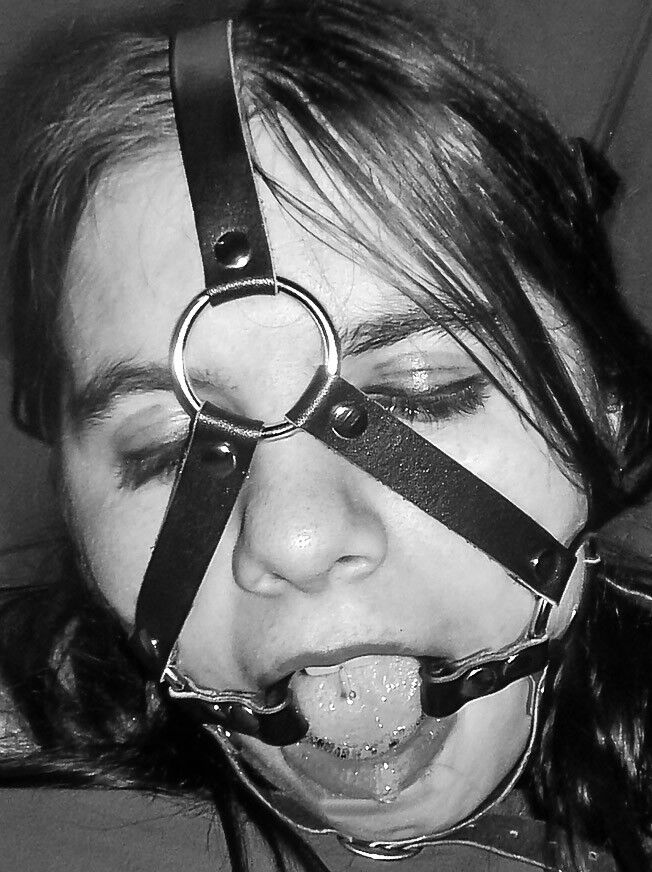 Free porn pics of Black & white headharness & ballgag headshots 13 of 26 pics