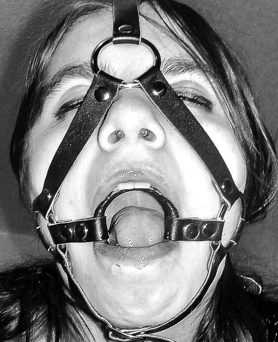 Free porn pics of Black & white headharness & ballgag headshots 7 of 26 pics