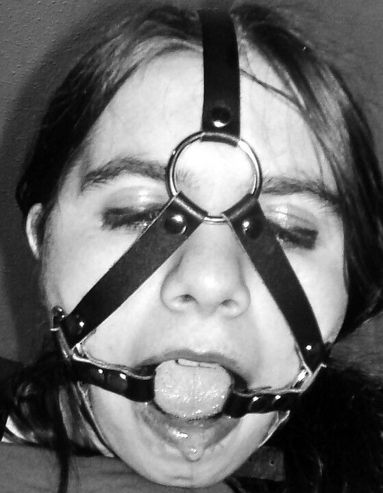 Free porn pics of Black & white headharness & ballgag headshots 19 of 26 pics