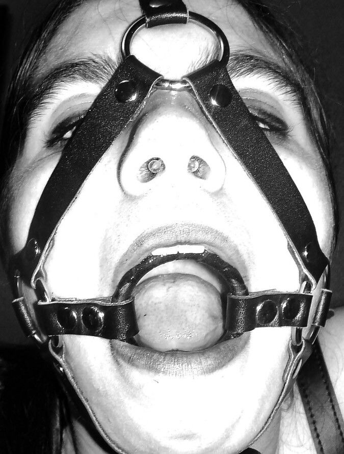 Free porn pics of Black & white headharness & ballgag headshots 2 of 26 pics