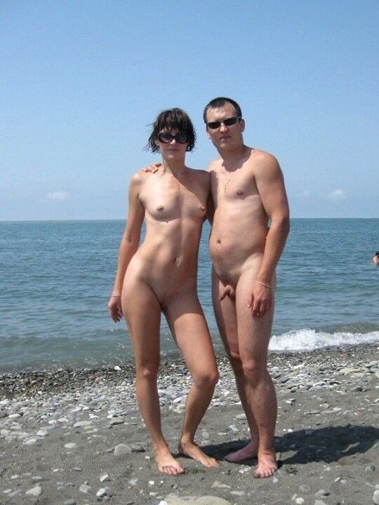 Free porn pics of shaved cunts and dicks on nudist beach 16 of 20 pics