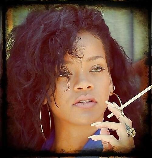 Free porn pics of my favorable singer Rihanna her smoking fetish pics having cigar 2 of 63 pics