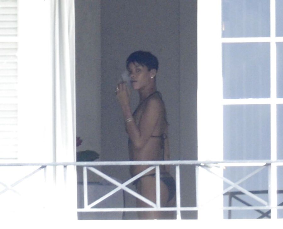 Free porn pics of my favorable singer Rihanna her smoking fetish pics having cigar 23 of 63 pics