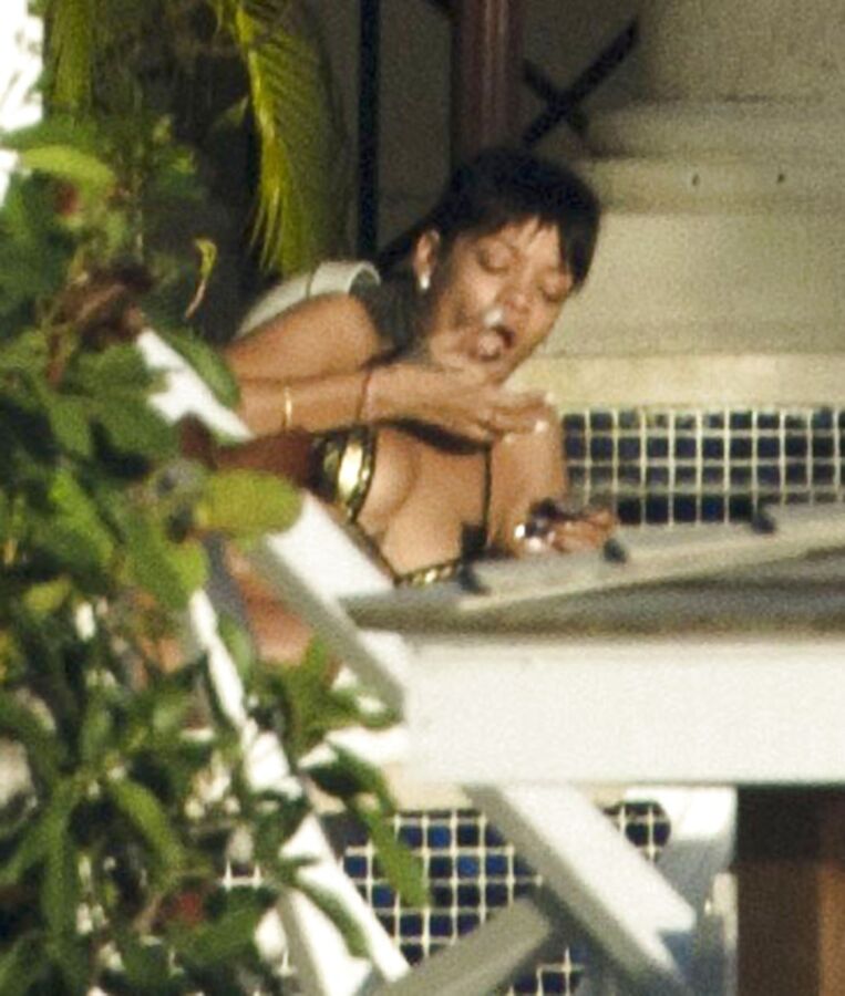 Free porn pics of my favorable singer Rihanna her smoking fetish pics having cigar 4 of 63 pics