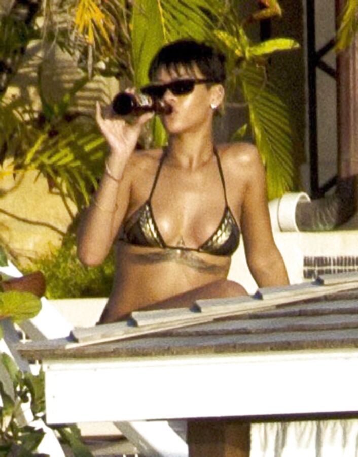 Free porn pics of my favorable singer Rihanna her smoking fetish pics having cigar 10 of 63 pics