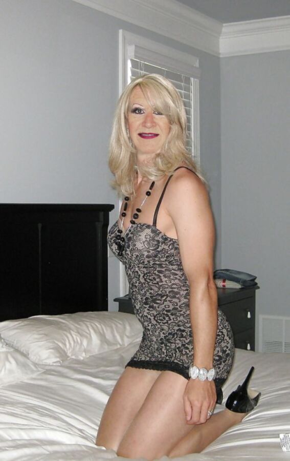 Free porn pics of Mature cuckold crossdresser 9 of 14 pics