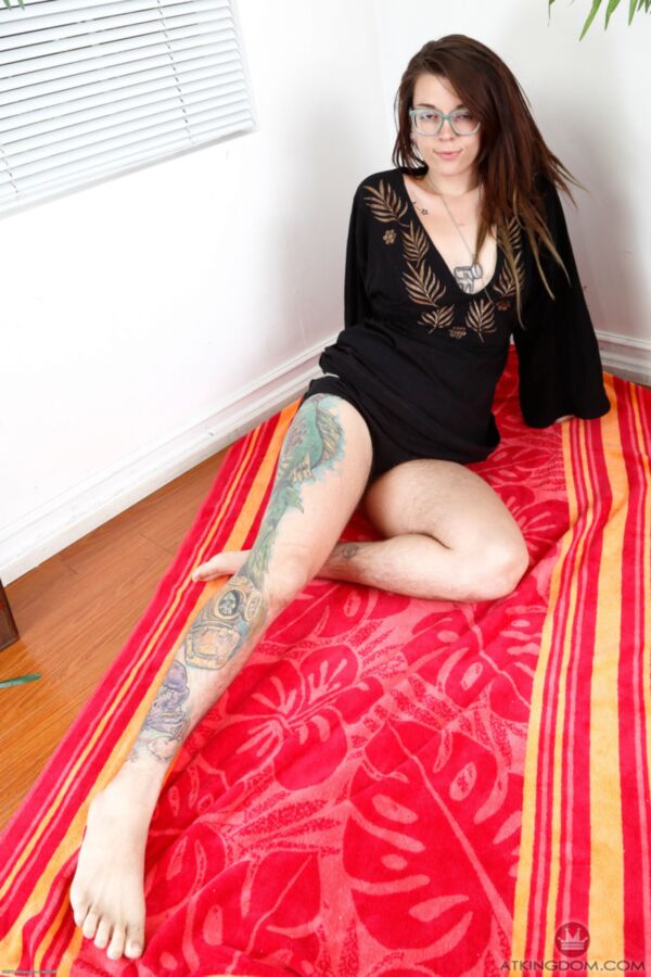 Free porn pics of Bespectacled and tatted Valkyree poses on a chair. 9 of 151 pics