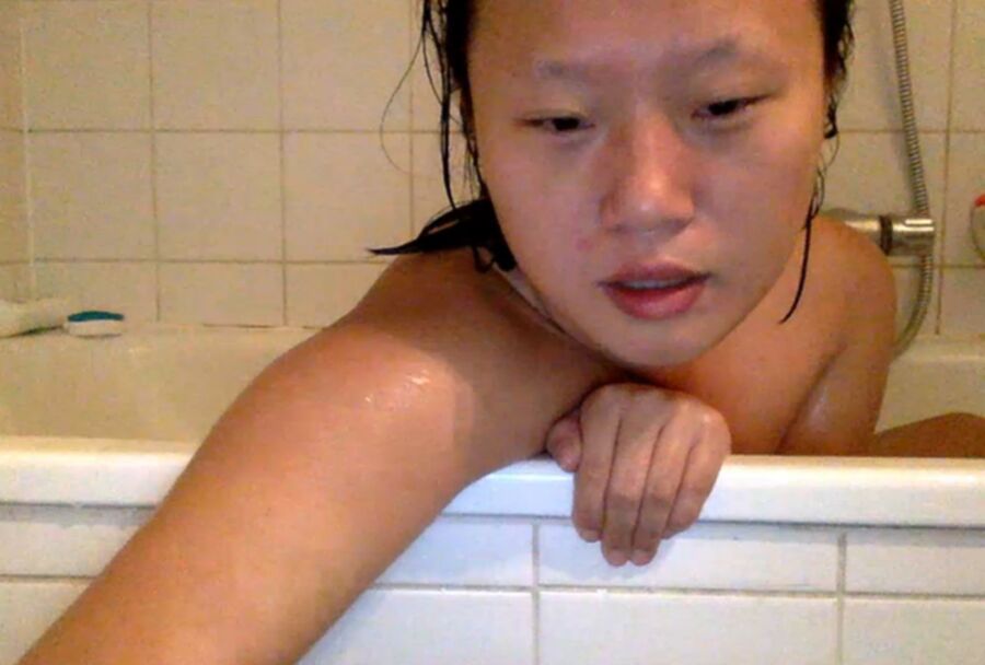 Free porn pics of Xinxin of Beijing China enjoys a Bath 24 of 50 pics