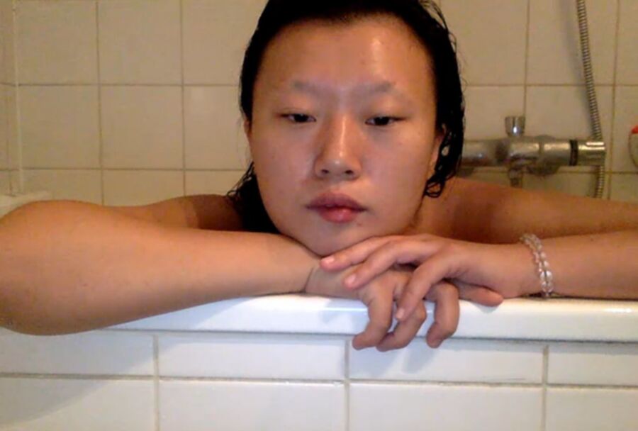 Free porn pics of Xinxin of Beijing China enjoys a Bath 13 of 50 pics