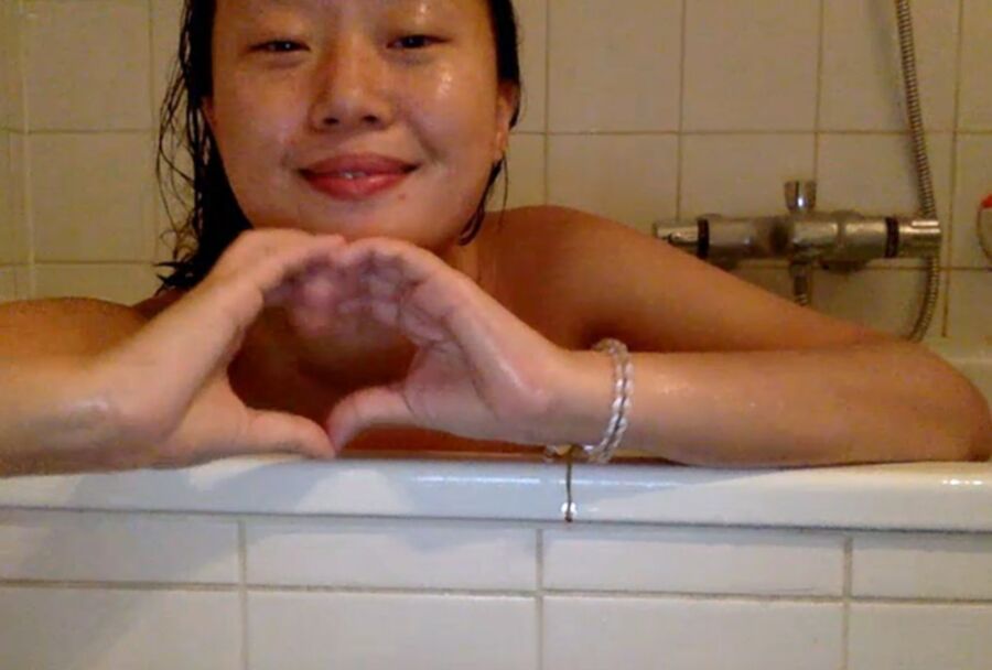 Free porn pics of Xinxin of Beijing China enjoys a Bath 20 of 50 pics