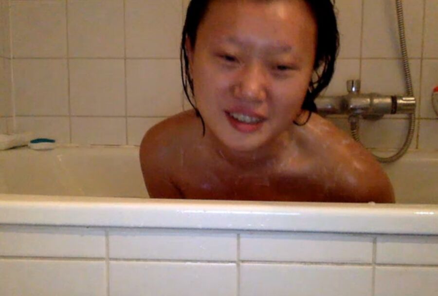 Free porn pics of Xinxin of Beijing China enjoys a Bath 5 of 50 pics