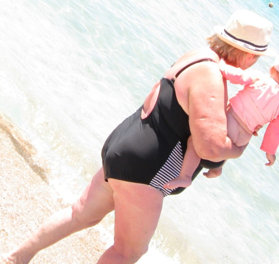 Free porn pics of Huge Tit Granny Beach candid 18 of 25 pics