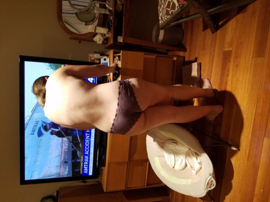 Free porn pics of My wife getting dressed, purple panties. 1 of 4 pics