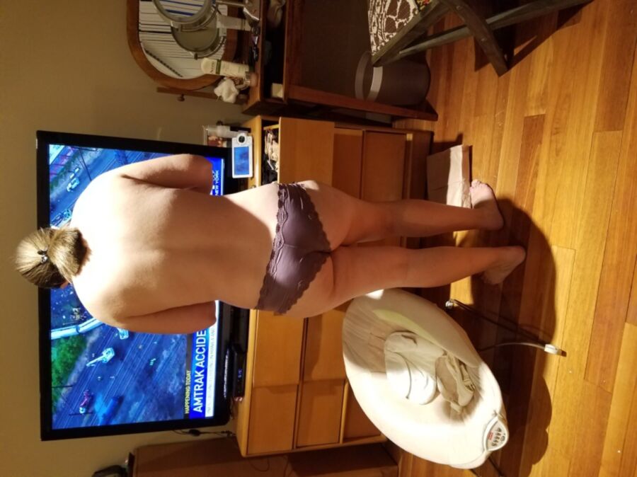 Free porn pics of My wife getting dressed, purple panties. 2 of 4 pics