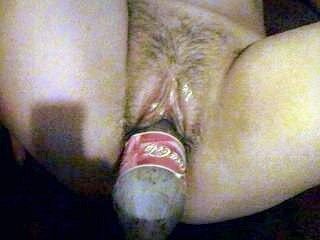 Free porn pics of Milf from Leeds enjoys a Coke 5 of 12 pics