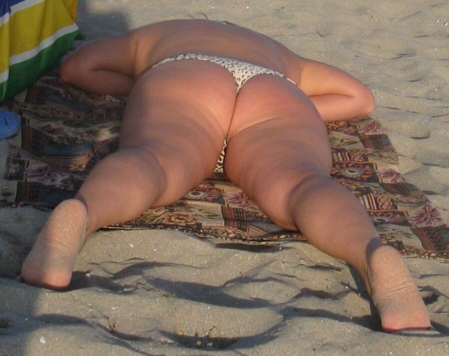 Free porn pics of Fat Ass Mom on a beach 12 of 25 pics