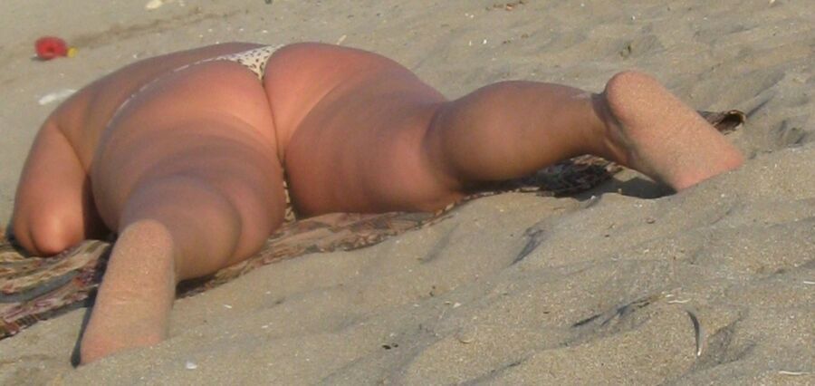 Free porn pics of Fat Ass Mom on a beach 20 of 25 pics