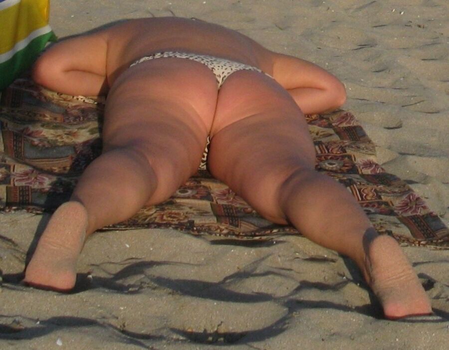 Free porn pics of Fat Ass Mom on a beach 13 of 25 pics