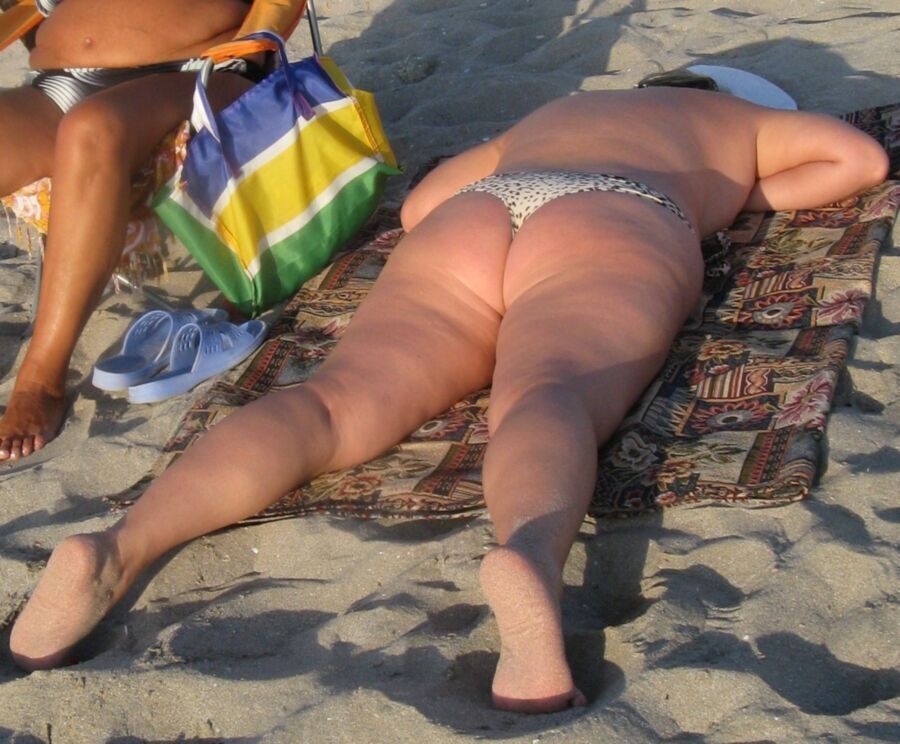 Free porn pics of Fat Ass Mom on a beach 6 of 25 pics