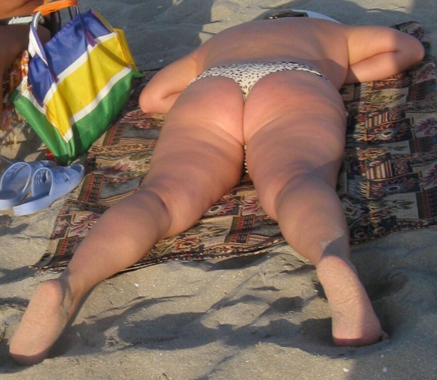 Free porn pics of Fat Ass Mom on a beach 8 of 25 pics