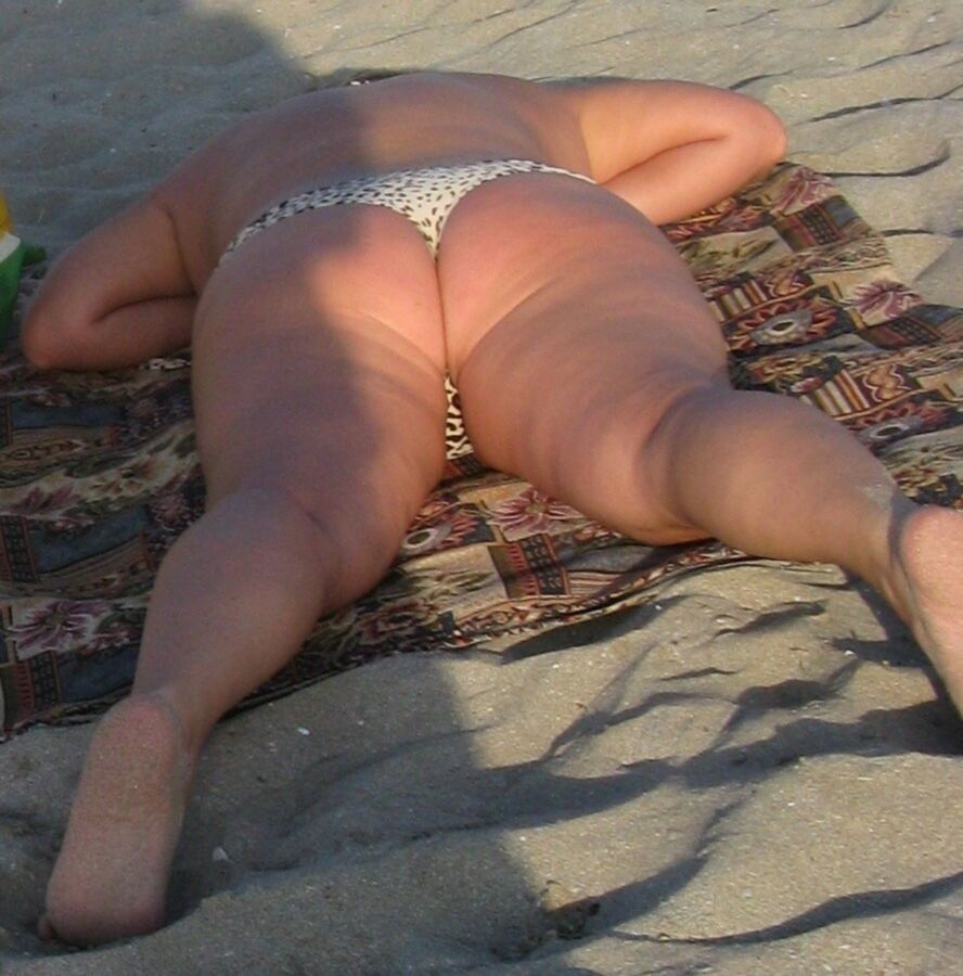 Free porn pics of Fat Ass Mom on a beach 9 of 25 pics
