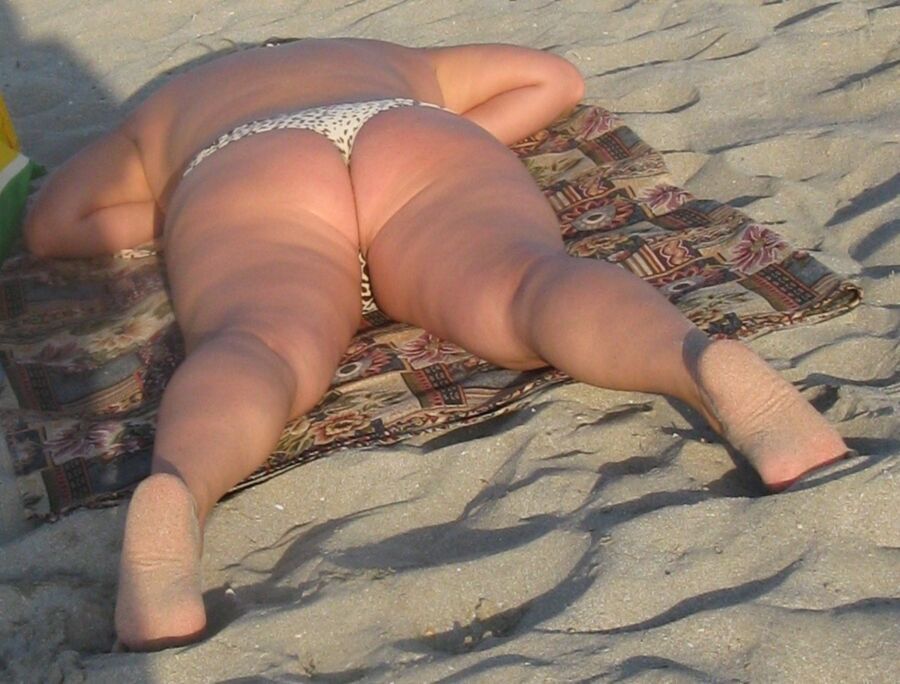 Free porn pics of Fat Ass Mom on a beach 11 of 25 pics