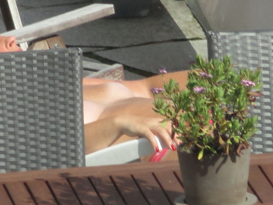 Free porn pics of oops, neighbours mature sunbathing naked tits!!! 1 of 17 pics