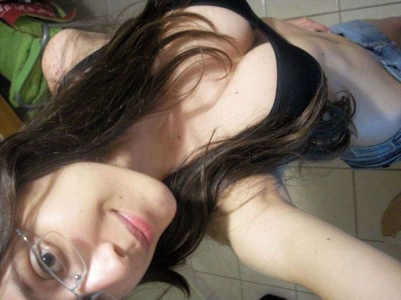 Free porn pics of Busty brunette with glasses 3 of 24 pics