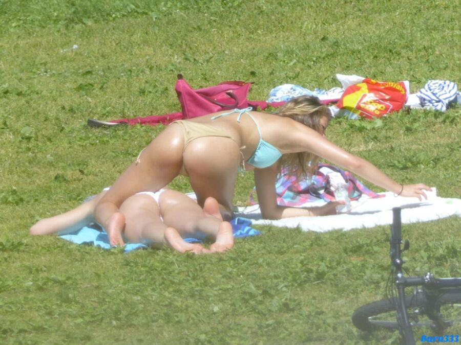 Free porn pics of Lesbian butt massage in a beachpark 2 of 69 pics