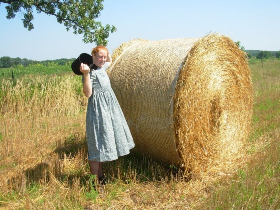Something is Amish with her clothing.