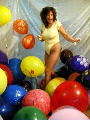Free porn pics of Voluptuous Woman Popping Balloons 23 of 388 pics
