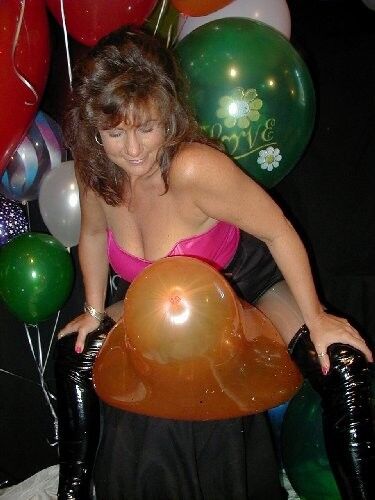 Free porn pics of Voluptuous Woman Popping Balloons 2 of 388 pics